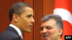 Turkish President Abdullah Gul (right) and U.S. President Barack Obama talk to reporters in Ankara on April 6.