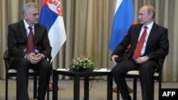 Russia's President Vladimir Putin (right) and Serbia's President-elect Tomislav Nikolic in Moscow on May 26.