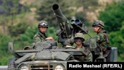 North Korean soldiers take part in military exercise near the border village of Panmunjom that separates the two Koreas since the Korean War, in Paju, north of Seoul, North Korea.