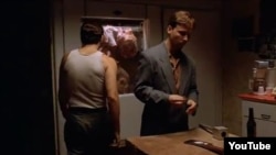 A famous scene from the pilot episode of "The Sopranos," in which Christopher Moltisanti (left) kills Czech "waste management" rival Emil Kolar (right) 