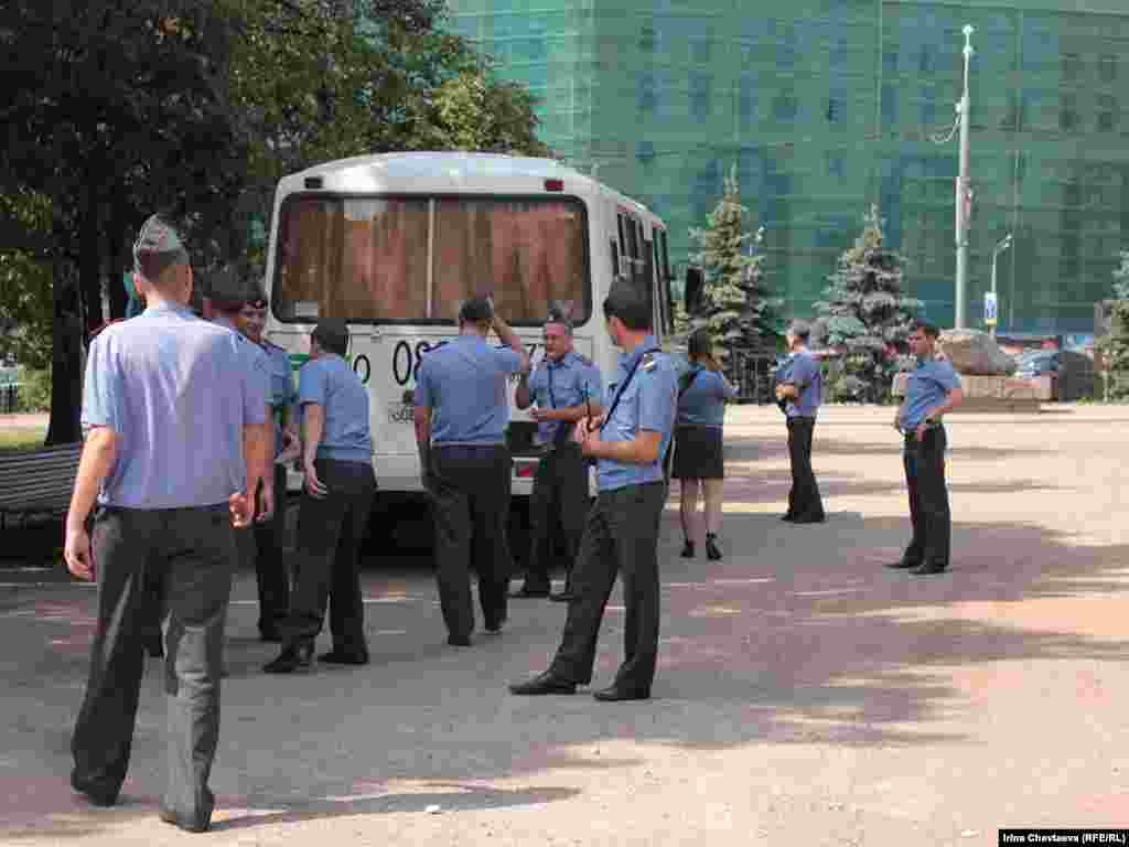 Police remove protesters from the Solovetsky Stone monument to victims of Soviet secret services in Moscow. 