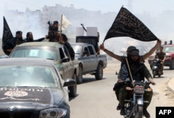 Fighters from the Al-Nusra Front in the northern Syrian city of Aleppo in May 2015