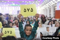 Zuhra Nawrozi's supporters attend an indoor rally in Kabul on October 12.