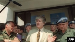 Radovan Karadzic in Pale in 1993, next to fellow UN indictee Ratko Mladic (left)