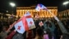 Georgian pro-democracy groups activists protest against a controversial "foreign influence" bill outside the parliament in Tbilisi on April 15. 