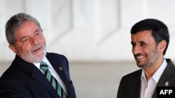 Does Brazil's Luiz Inacio Lula da Silva (left) have any chance of convincing Iran to follow his country's example and abandon its alleged attempts to acquire nuclear weapons?