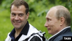 Russian President Dmitry Medvedev (left) and Prime Minister Vladimir Putin