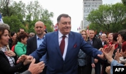 Republika Srpska President Milorad Dodik presses the flesh in Banja Luka last year (file photo)