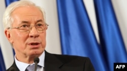 Ukraine's newly appointed Prime Minister Mykola Azarov speaks to reporters today in Kyiv.