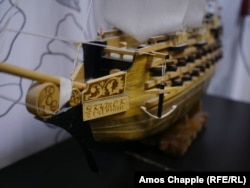 A model ship decorates the newspaper's offices, its bow featuring the newspaper's masthead -- a gift from a loyal reader.