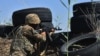 An Armenian solider mans an outpost on his country's border with Azerbaijan. (file photo)