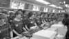 A phalanx of young, crisp-uniformed employees at the counter of Russia's first McDonald's restaurant on Pushkin Square in 1990. 