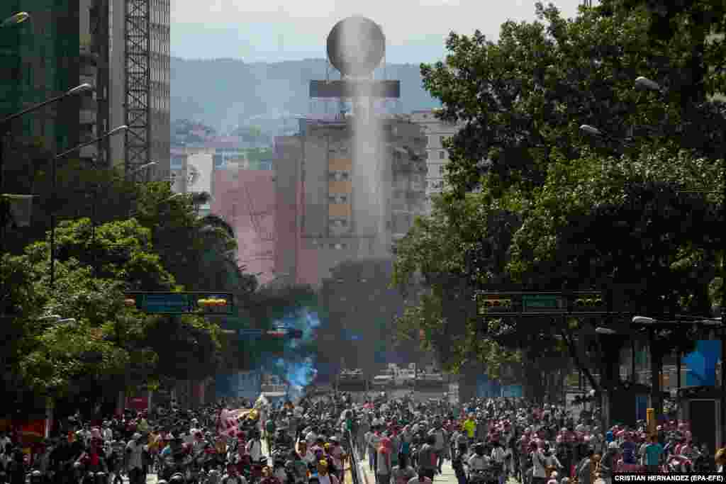 Demonstrators take to the streets of Caracas after members of the opposition called for people to ignore the legitimacy of Maduro&#39;s second term. Along with charges of election fraud, ​Maduro has been&nbsp;criticized for his handling of Venezuela&#39;s collapsing economy and for alleged human rights abuses.&nbsp;