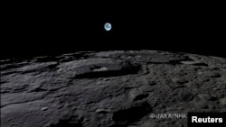 The Earth rises over the Moon's surface in this still from a camera onboard Japan's "Kaguya" lunar probe.