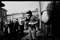 A thirsty Leningrad man downs a drink in 1974.