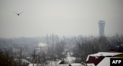 The control tower of the Donetsk airport is seen through the gloom on December 2.