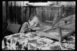 A boy smiles shyly into the camera in Orekhovo, near Leningrad in 1978.