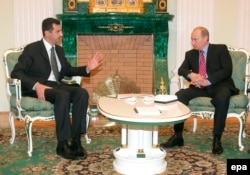 Russian President Vladimir Putin (right) and Syrian President Bashar al-Assad met in Moscow in 2006. Putin's intentions in Syria are likely to be the most closely watched portions of his UN speech.