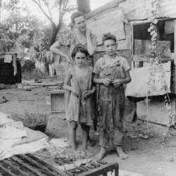 A woman and her children living in poverty in Oklahoma in 1936.