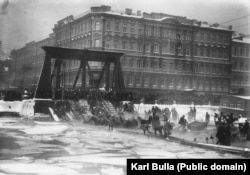 A group of horses being rescued after a bridge collapsed into the icy water of a St. Petersburg canal.