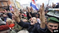 People in the Croatian capital, Zagreb, cheer seconds after the UN war crimes court announced the acquittal of former Croatian generals Ante Gotovina and Mladen Markac.