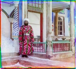 A bureaucrat stands outside the emir's palace in Bukhara.