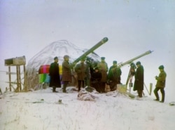 Sergei Prokudin-Gorsky (second from left) waiting in vain for a break in the clouds to observe a solar eclipse from Central Asia’s Tien-Shan mountains on January 1, 1907.