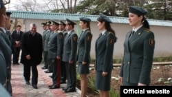 De facto South Ossetian leader Eduard Kokoity (walking toward camera) at a meeting with economic-security staff in Tskhinvali (undated)