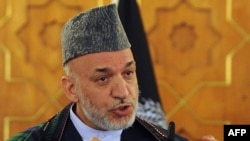 Afghan President Hamid Karzai has appealed again to insurgents to lay down their weapons.