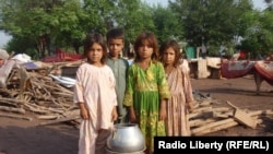 Refugee Afghan children in Pakistan. There are more than 3 million Afghan refugees living in the border regions of neighboring Iran and Pakistan.