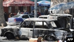 Burned cars on the streets of Yerevan on March 2, 2008