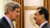 Pakistani Prime Minister Yousuf Raza Gilani (right) shakes hands with U.S. Senator John Kerry during a May 16 meeting in Islamabad