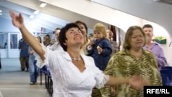 Worshippers take part in the marathon concert at the New Life Church