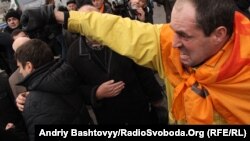 One of the opposition supporters who gathered to celebrate Freedom Day on Independence Square in Kyiv on November 22.