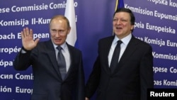 The talks between Russia's Prime Minister Vladimir Putin (left) and European Commission President Jose Manuel Barroso were less congenial.