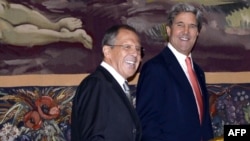 Russian Foreign Minister Sergei Lavrov (left) and U.S. Secretary of State John Kerry at an earlier meeting, at UN headquarters in Geneva on September 13.