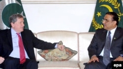 Pakistani President Asif Ali Zardari (right) met with Richard Holbrooke in Islamabad on February 10.