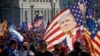 Supporters of U.S. President Donald Trump participate in a "Stop the Steal" protest after the election was called for Democratic candidate Joe Biden in Washington on November 14, 2020. 