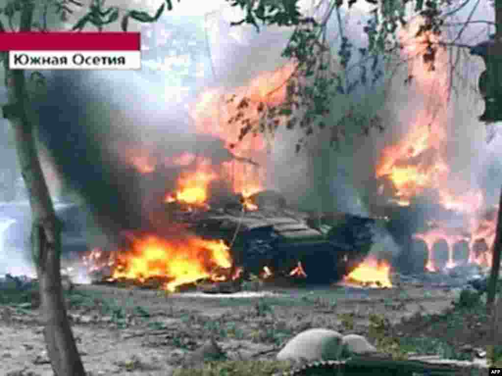 A Russian Channel One television grab shows a Georgian tank burning in Tskhinvali. A top Russian military commander said more than 10 Russian peacekeepers were killed during fighting in the South Ossetian capital.