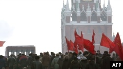 Communist supporters march in front of Lenin's mausoleum in Moscow on January 21.