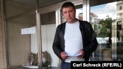 Russian citizen Vladimir Luzgin pictured outside the Czech Interior Ministry, shortly after Prague authorities denied his asylum request on May 15. 