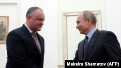 Moldovan President Igor Dodon (left) meets with Russian President Vladimir Putin at the Kremlin in Moscow in January 2019.