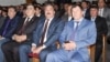 Interior Minister Ramazon Rahimzoda (right) is apparently no stranger to writing.