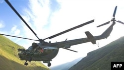 A Russian helicopter patrols the Russian-Georgian border in Chechnya.