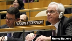 Russia's deputy UN envoy, Igor Pankin (right), says the resolution was sent to the council's other 14 members ahead of a briefing on July 11 by UN-Arab League envoy Kofi Annan on efforts to revive his peace plan.