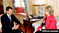 U.S. Secretary of State Hillary Clinton with Turkmen Foreign Minister Rashid Meredov in Washington on June 24.