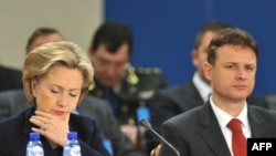 U.S. Secretary of State Hillary Clinton (left) and her Croatian counterpart, Gordan Jandrokovic, at the NATO foreign ministers meeting in Brussels.