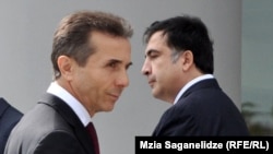 Georgian President Mikheil Saakashvili (right) with Prime Minister Bidzina Ivanishvili (file photo)