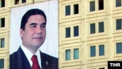 A huge portrait of Turkmen President Gurbanguly Berdymukhammedov on the side of a building in Dashoguz