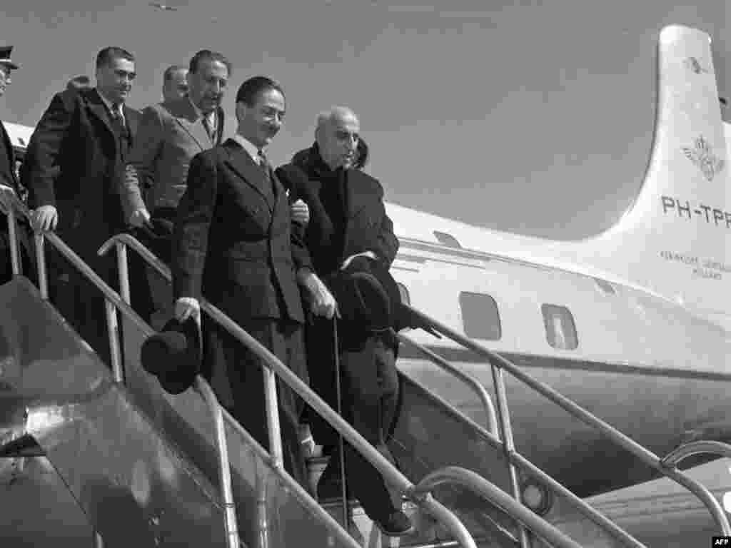 Former Iranian Prime Minister Mohammad Mossadegh steps off a plane in August 1953.